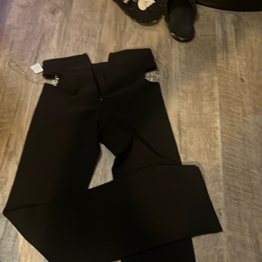 Cut out on sides with gems and pearls!!
Dress pants